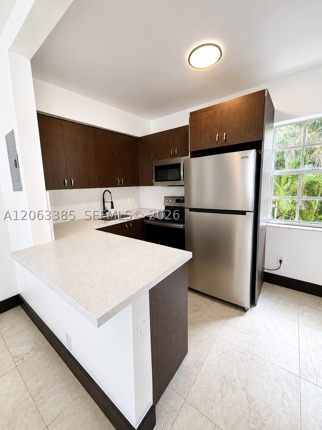 551 NE 62nd St – photo 1