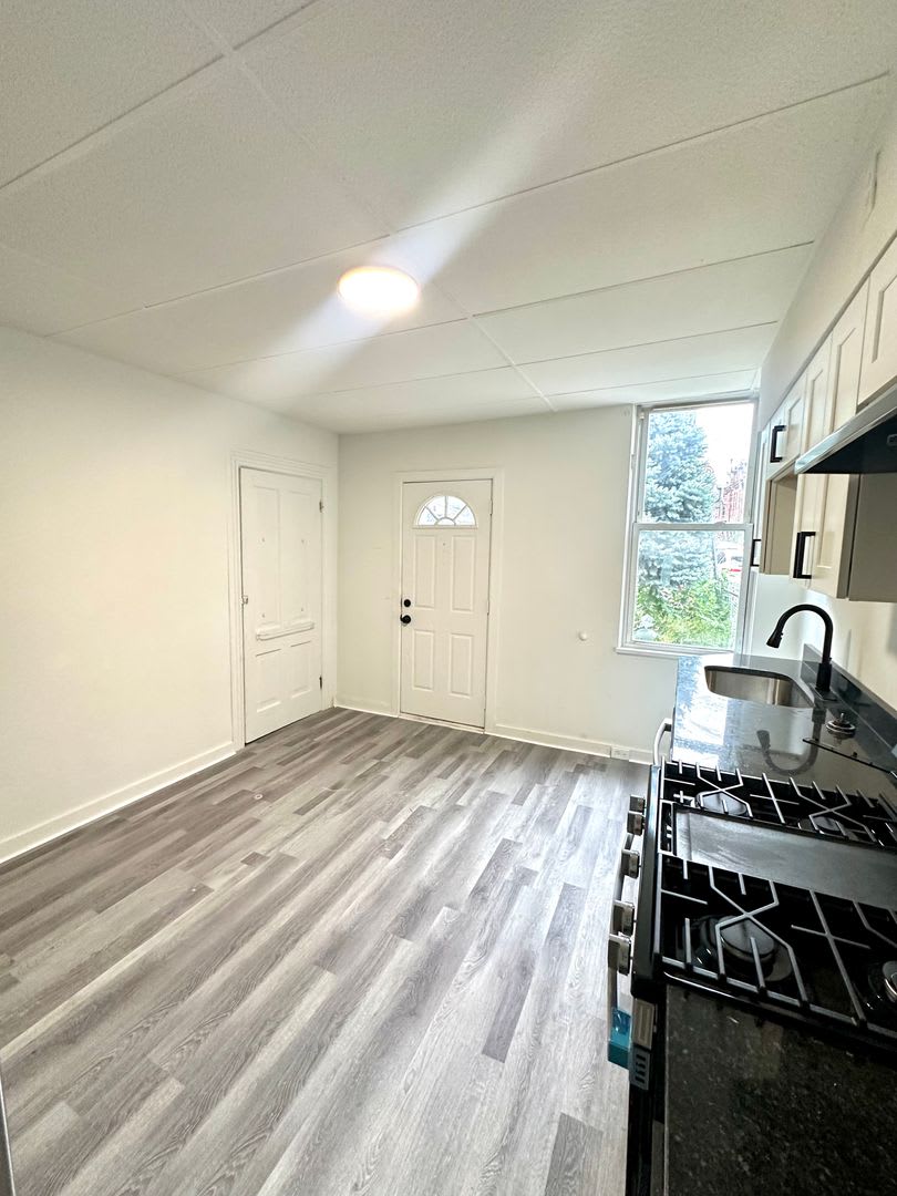 Updated 2 Bed 1 Bath Home W Bonus Space Convenient Location Walkable Neighborhood Available Now – photo 2