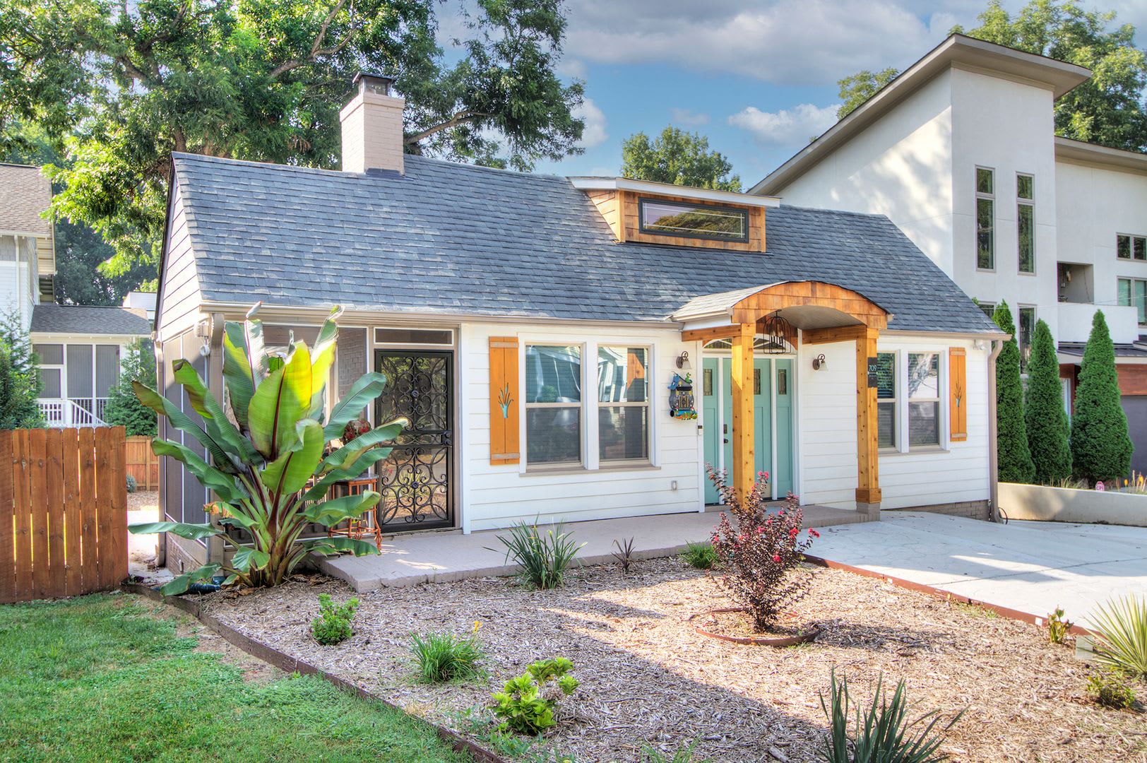 Discover the charm of this top-floor unit in a beautifully updated single-family bungalow – photo 2