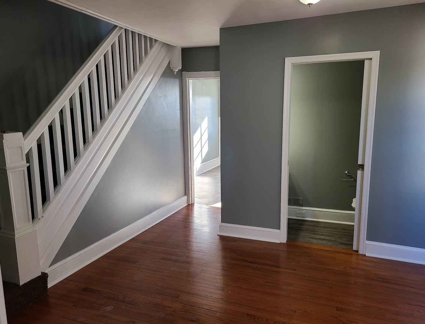 Twin home with updated kitchen, washer/dry on first floor, private back yard and porch. – photo 5