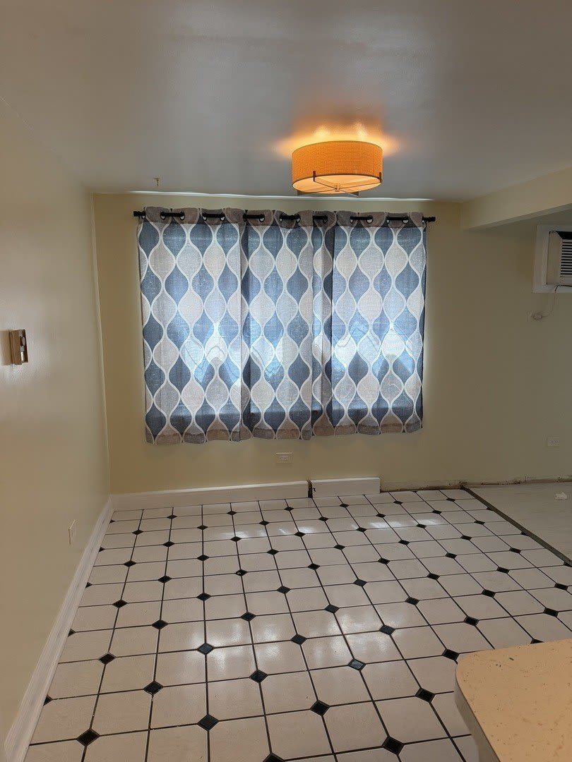 5743 S KENTON Avenue – photo 4