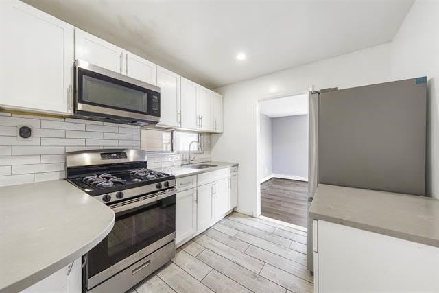 906 76TH ST – photo 3