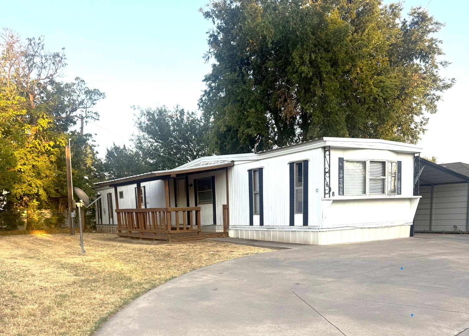 2 bedroom 1.5 bath with Covered Deck and Carport – photo 1