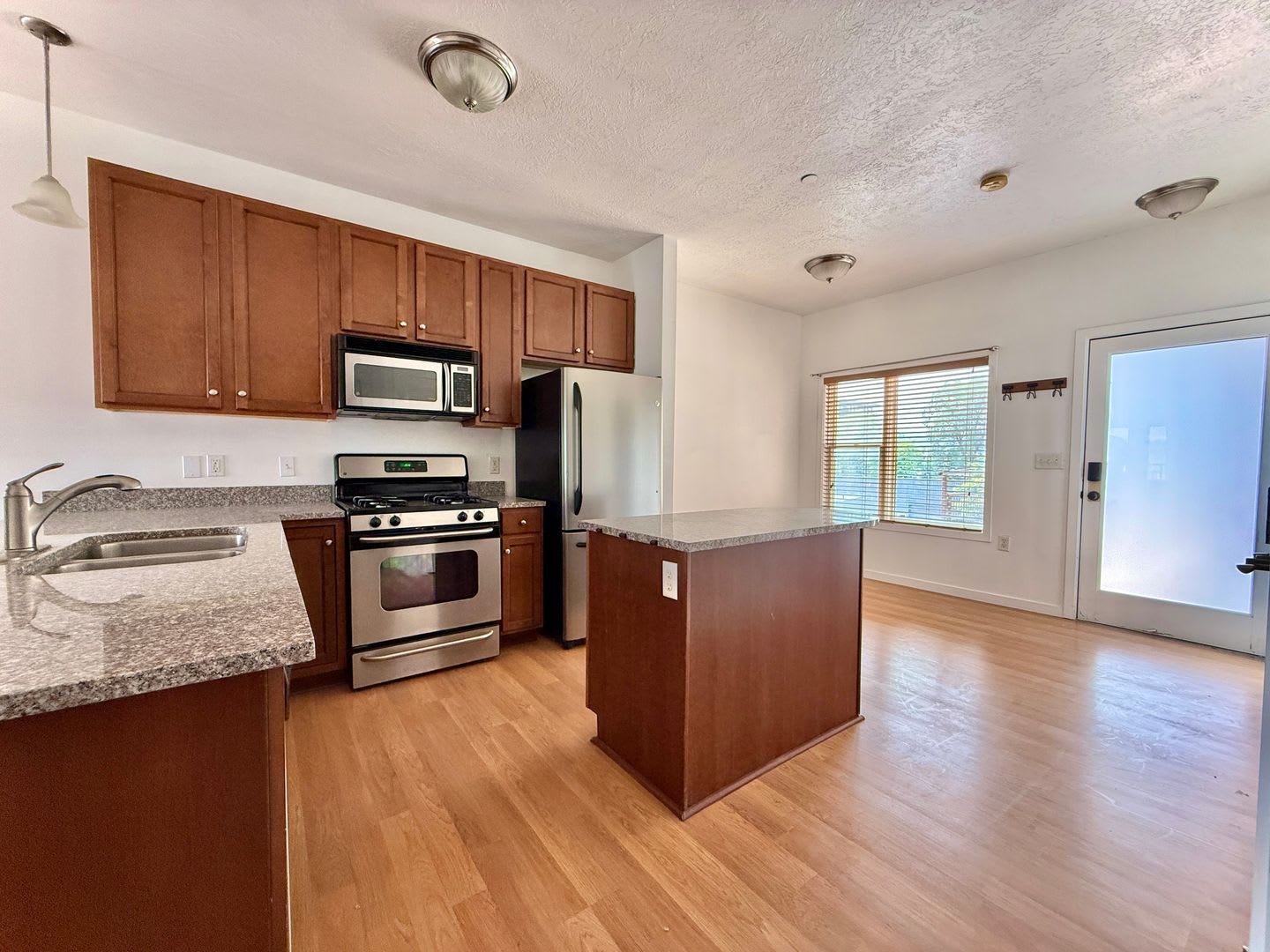 Beautiful 2BR Condo in Gated Community Near TRAX – photo 2