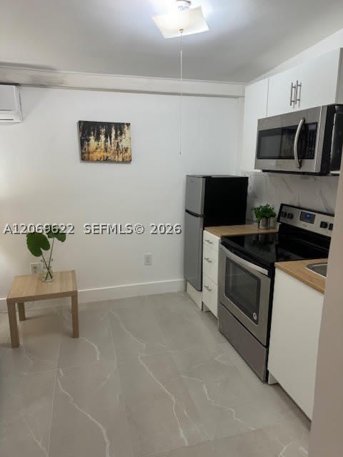 1270 NE 210th Ter – photo 2