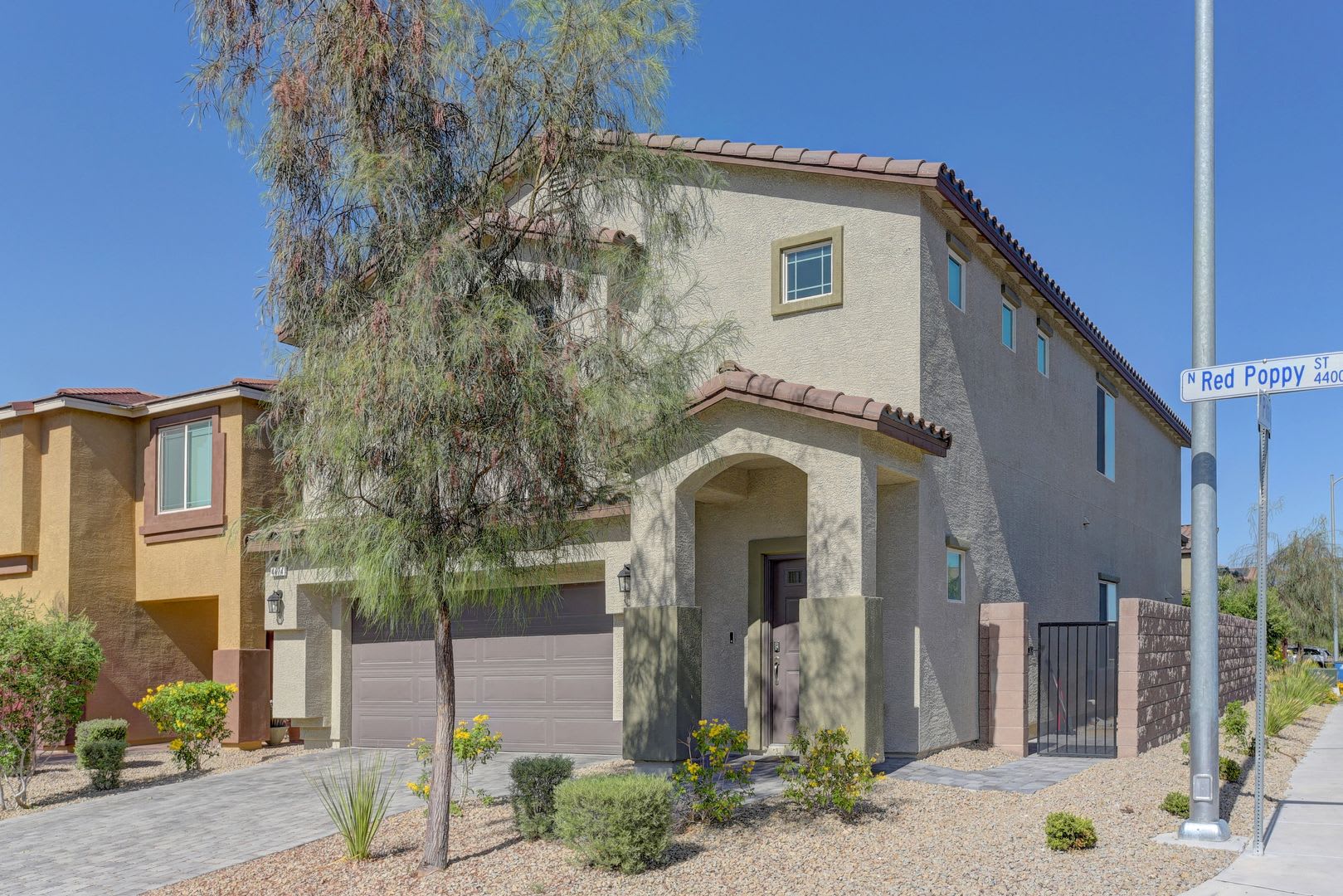 BEAUTIFUL TWO-STORY HOME FEATURING ATTRACTIVE DESERT LANDSCAPING. – photo 2