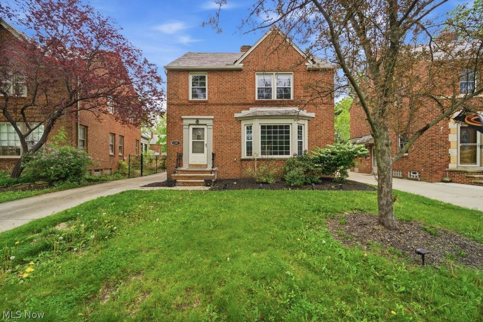 Beautiful 4-Bedroom Brick Colonial in University Heights – photo 1