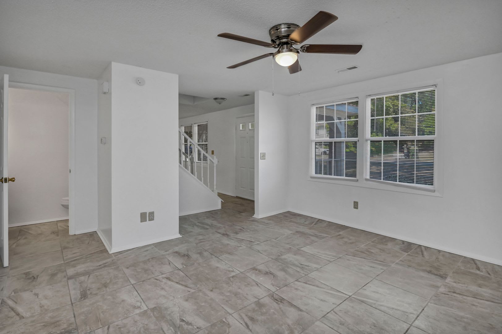 Spacious 3BR Home with Covered Front Porch & Expansive Backyard Near Dining & Shopping – photo 4