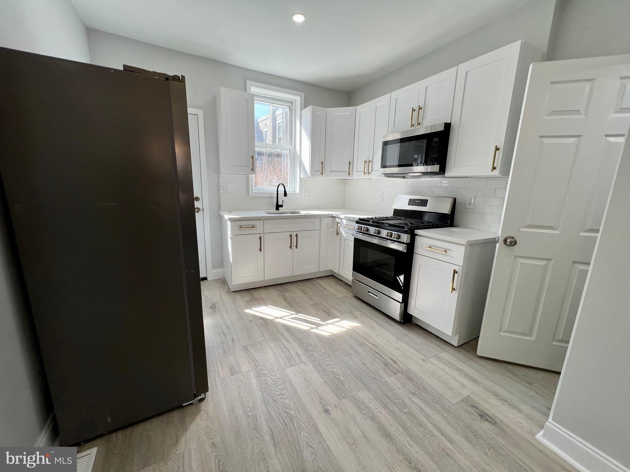 5744 DELANCEY Street – photo 4
