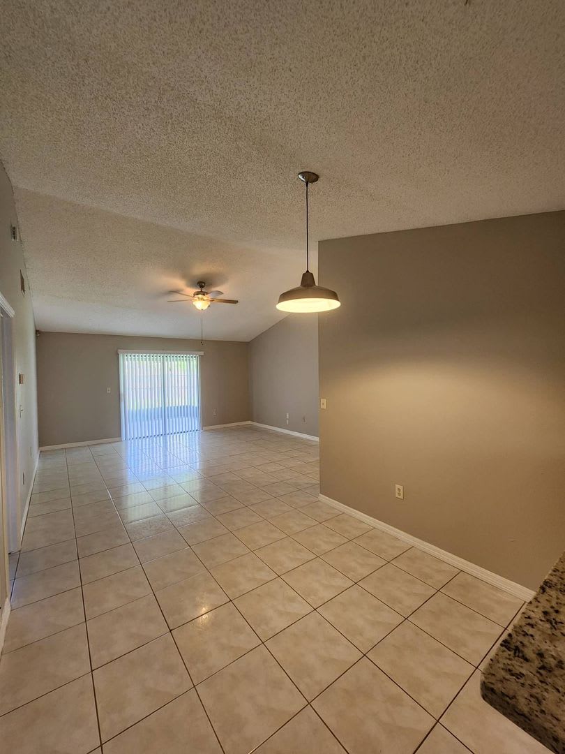 Move-In Ready Poinciana Gem with a Brand-New Kitchen & Screened Porch! – photo 2