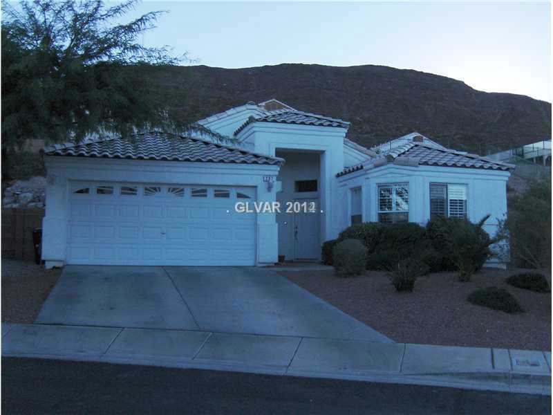 1 story home with 2 car garage in a gated community – photo 2