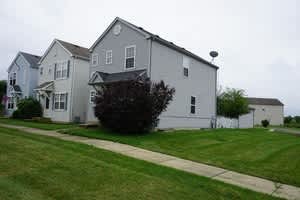 3 bedrooms,1.5 baths, 2 car detached garage and a full basement. – photo 1