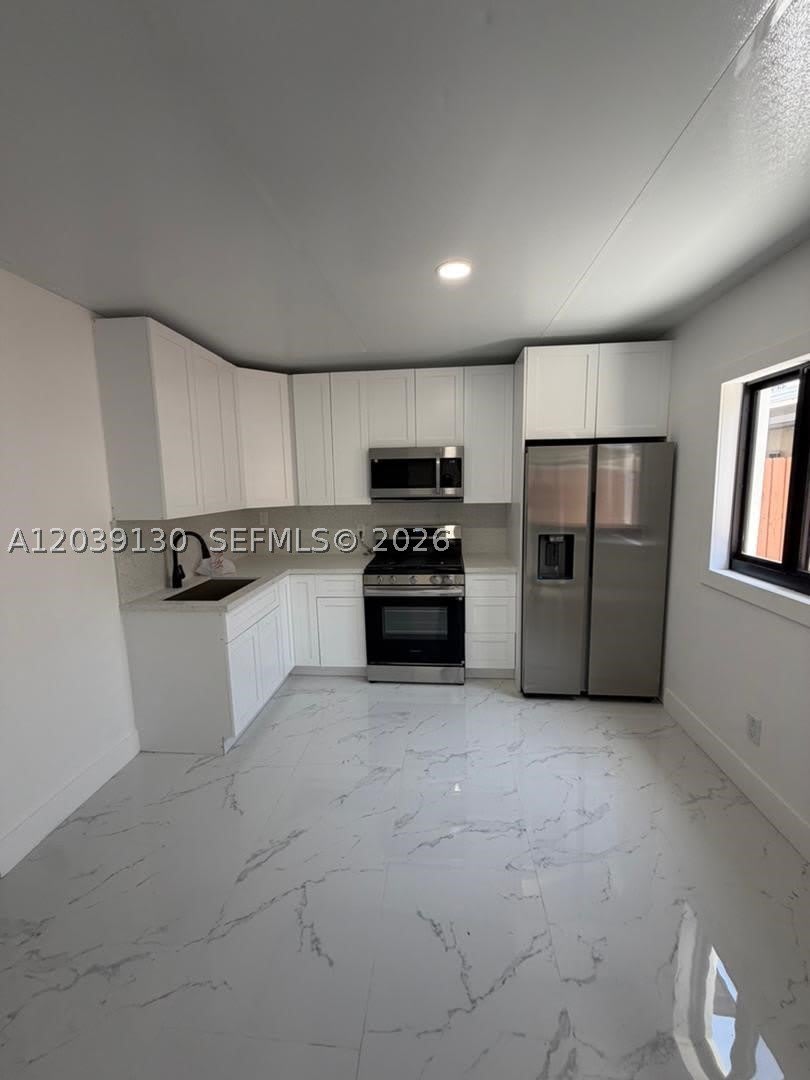 1230 NW 135th St – photo 2