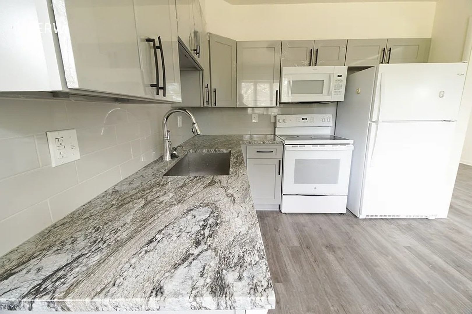 Beautifully Renovated, Spacious 4BR Home w/ Basement & Backyard! – photo 4