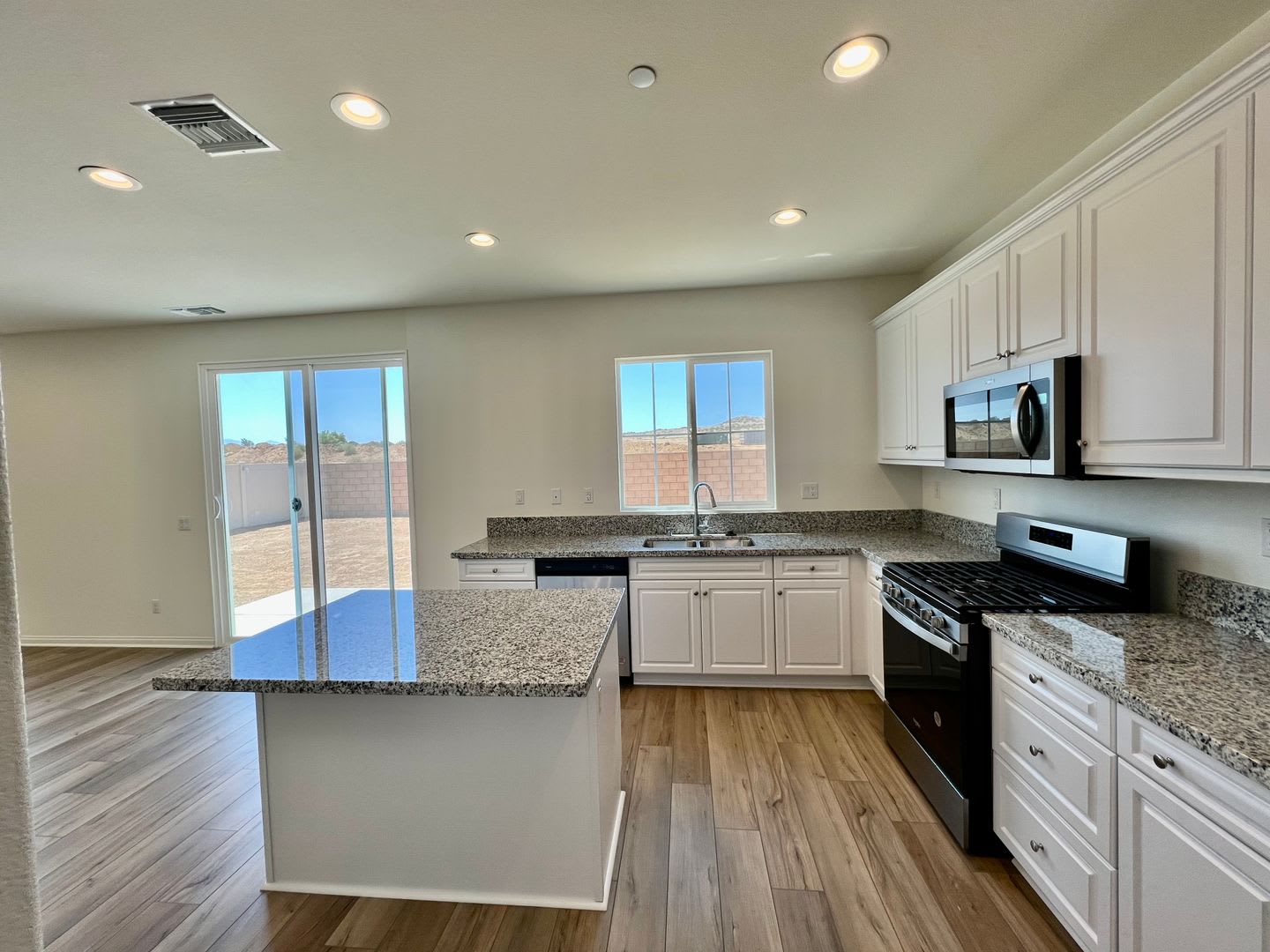 Newer 2022-Built, 4BR Home with Solar, Loft, Downstairs Bedroom, and Backyard – photo 2