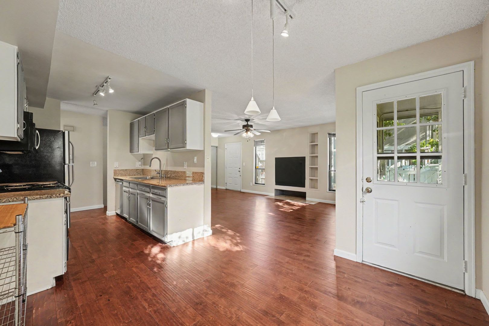 Spacious 2BR/2BA Corner Unit with Finished Basement, Private Patio & Garage – photo 3