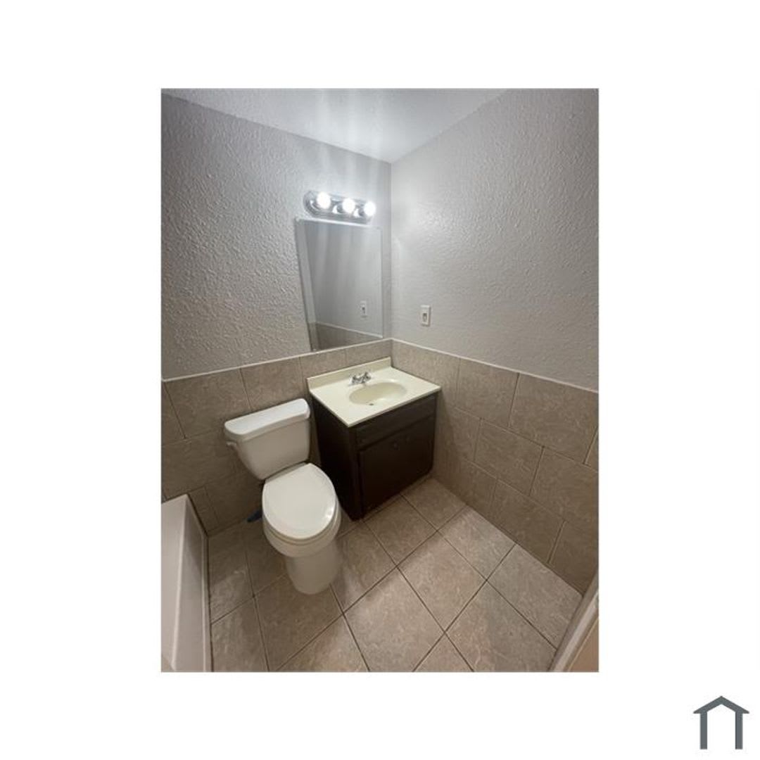 Discover your dream home in this beautifully renovated four-bedroom, two-bathroom house. – photo 2