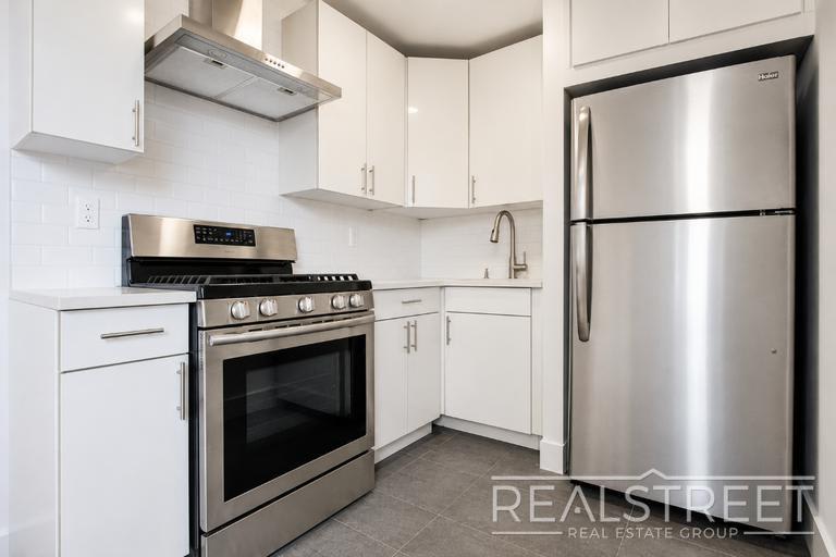90-02 Queens Blvd – photo 4