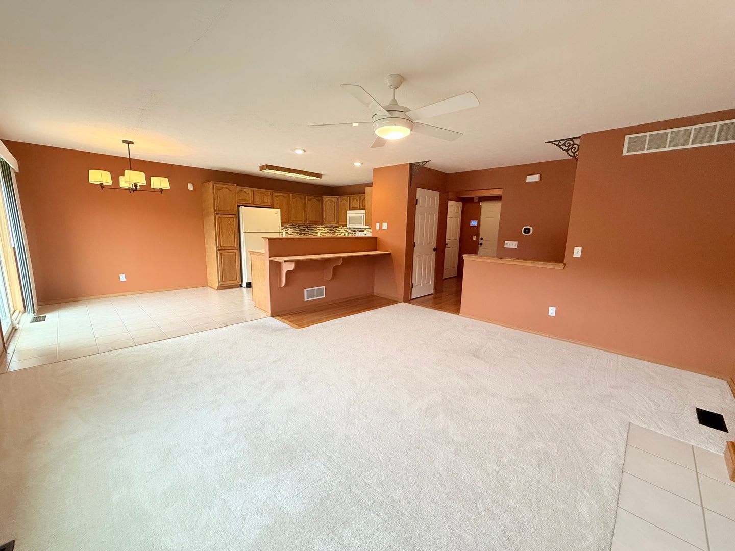 Spacious Townhome with Finished Basement, Fenced Yard & 2-Car Garage – photo 4