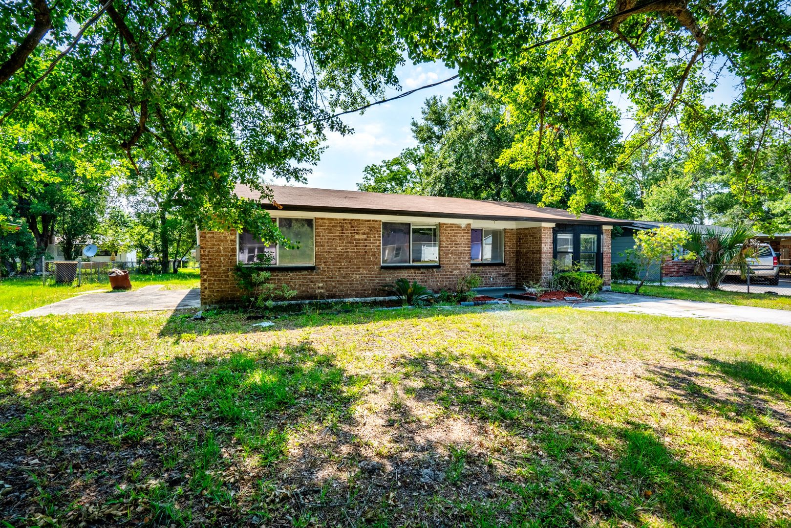 Timuquana 3BR/2BA Solid Brick Home w/ Flex Space & Private Yard – photo 3
