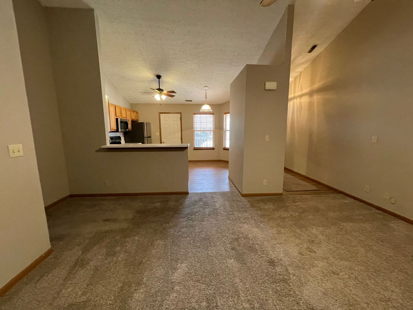 Wake up to a stunning pond view in this beautiful 2 BD 2BA duplex with a 2 car attached garage – photo 4