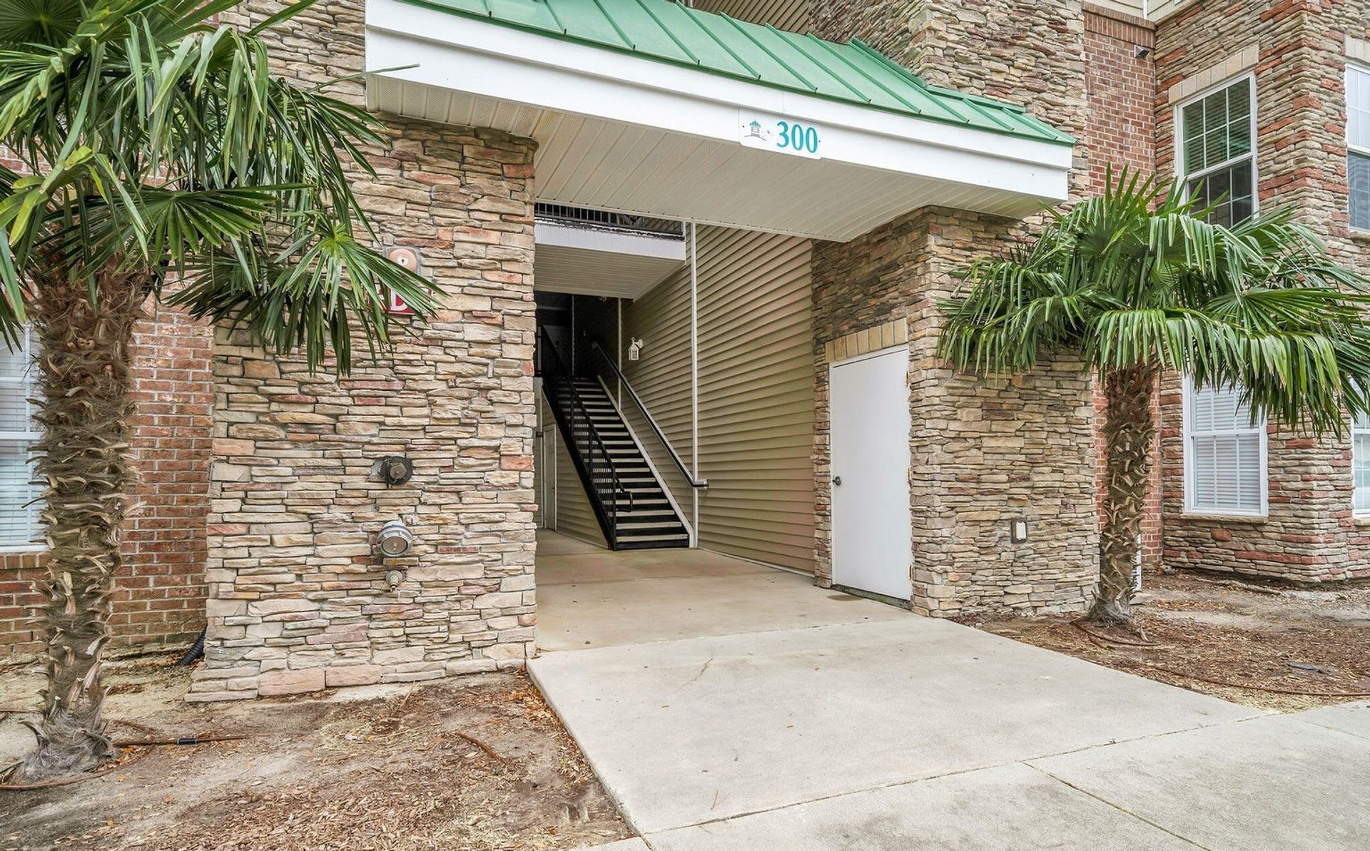 Don't miss this 4-bed, 3-bath condo TWO miles from the ocean! – photo 2