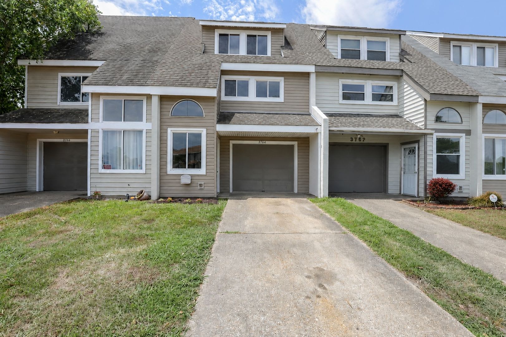 Surprisingly Spacious 3-Story Townhome With Garage and Huge Back Yard – photo 1