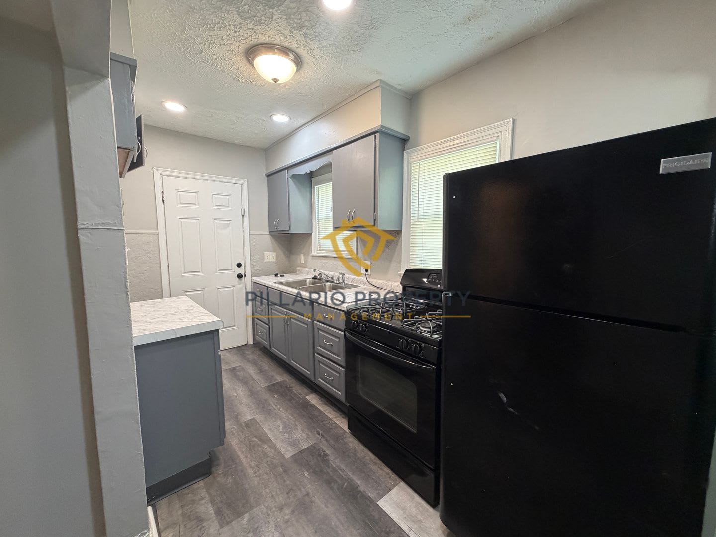Charming 3-Bedroom Stone Bungalow with 2-Car Detached Garage & Fenced Yard, Available NOW! – photo 3