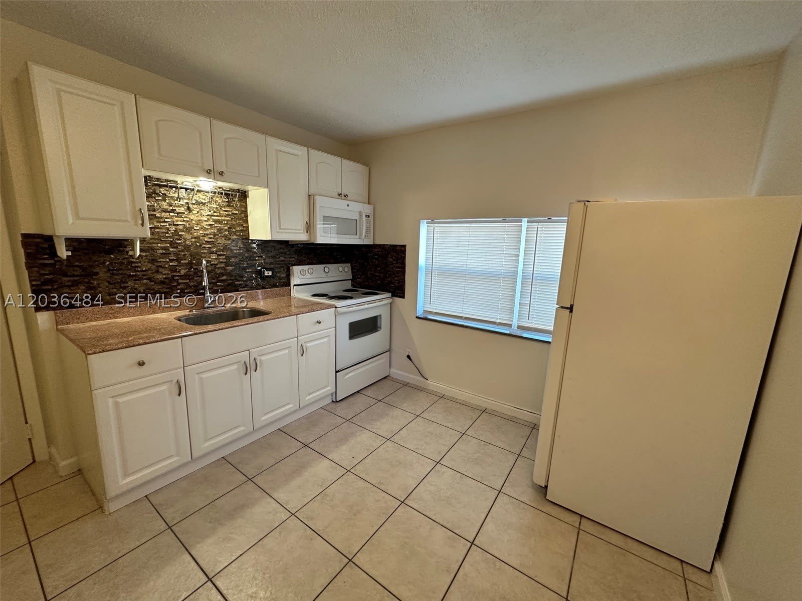 1245 Ne 15Th Ave – photo 3