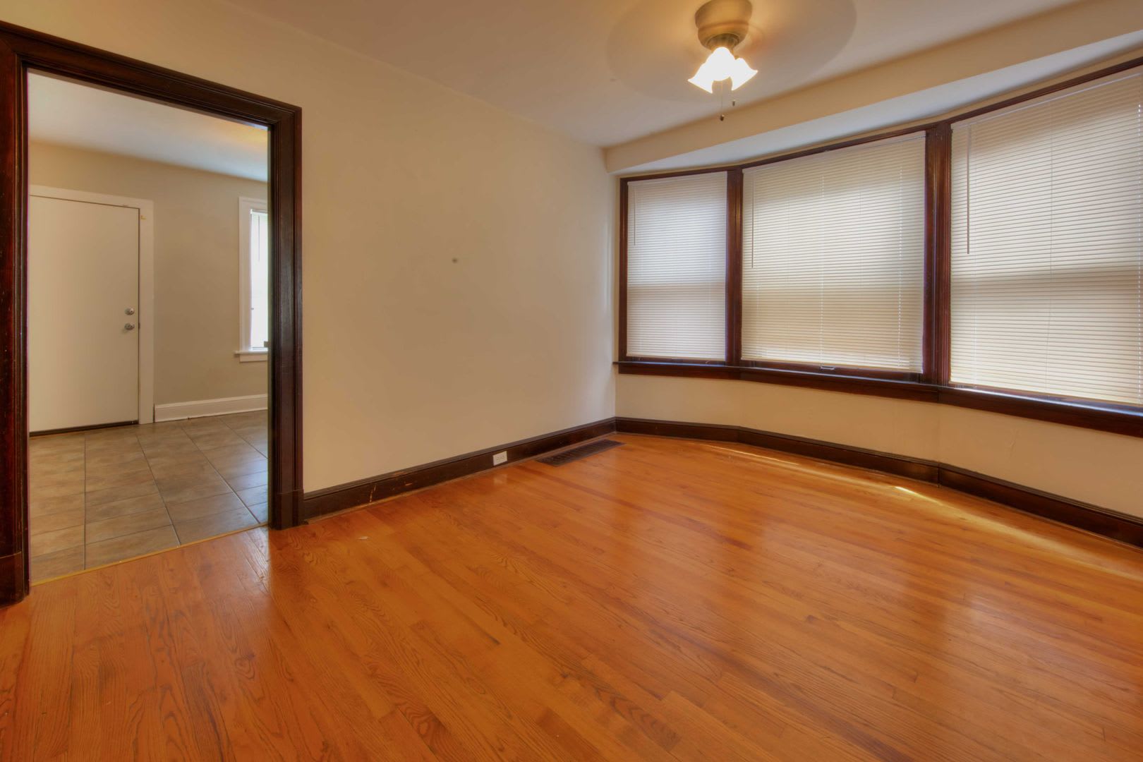 This Completely Refinished Two Bedroom One Bathroom Home Features Brilliant Hardwood Floors Throughout – photo 4