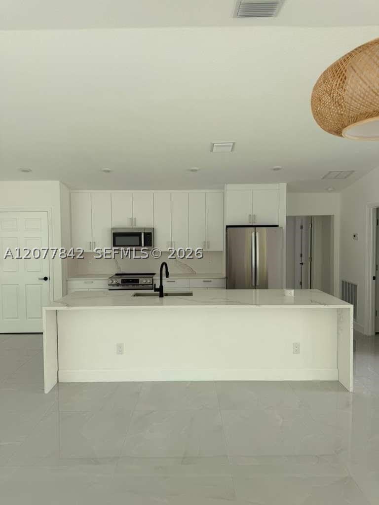 8636 100th Ct – photo 2
