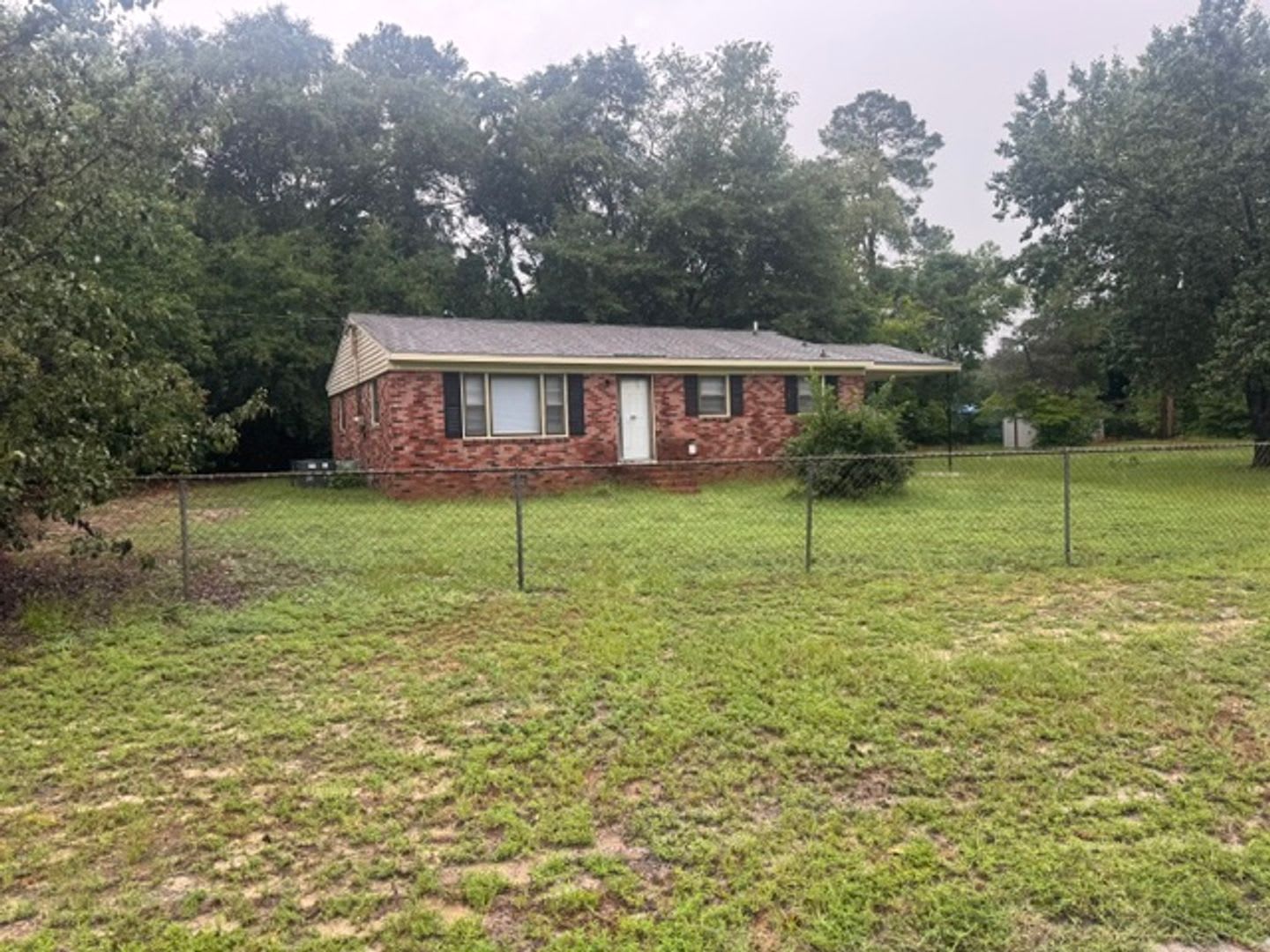 3 bedroom, 1 bathroom home on 1/2 acre lot with storage – photo 1