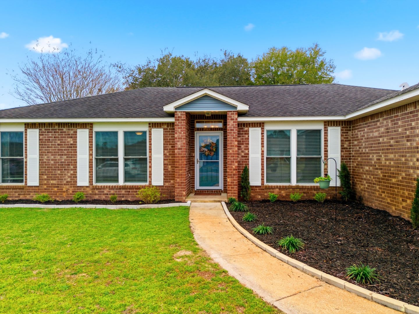 Welcome to This Beautifully Maintained 4/2 Brick Home by the Base! – photo 3