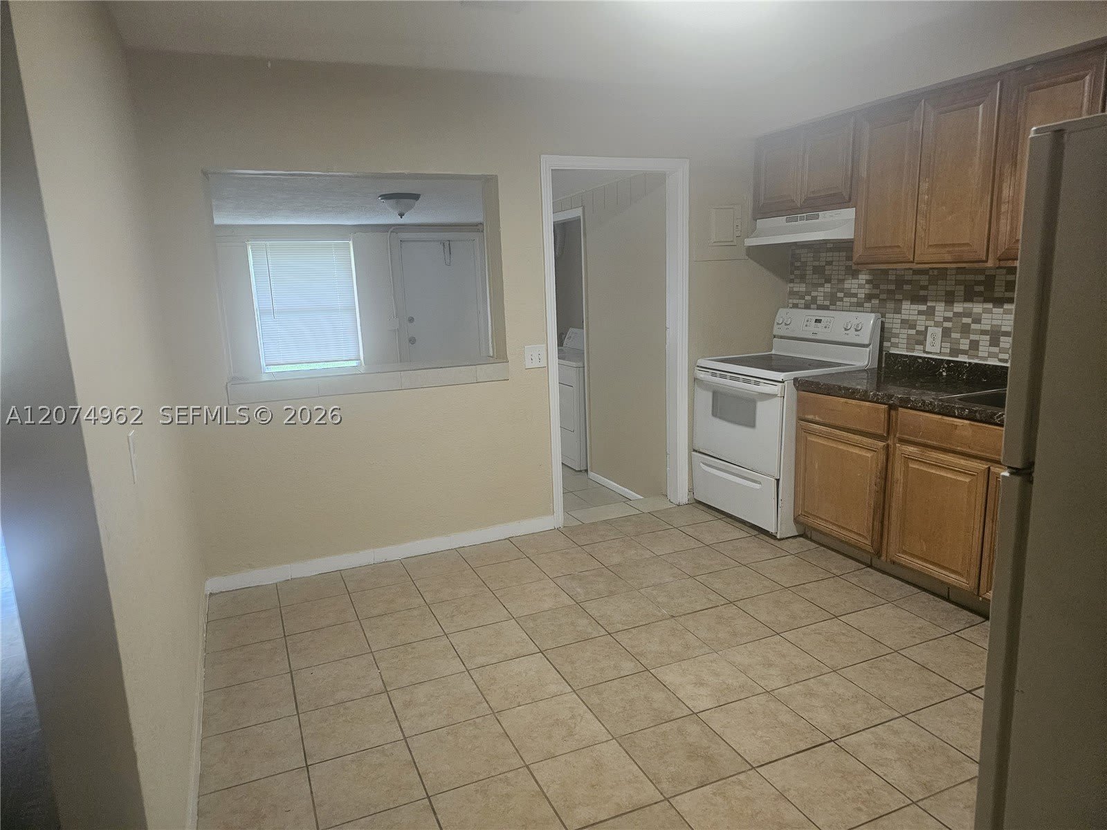 6112 SW 32nd St – photo 2
