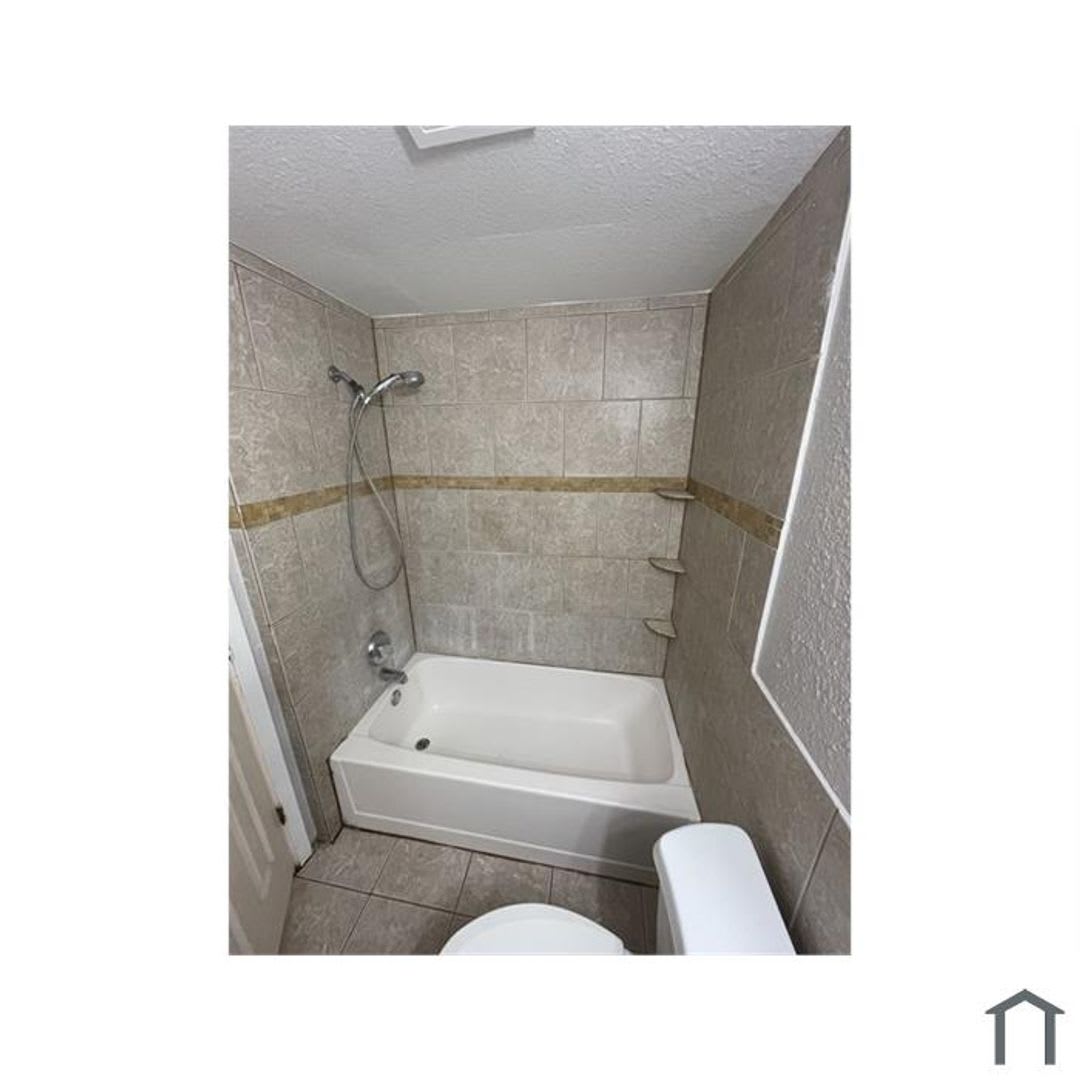 Discover your dream home in this beautifully renovated four-bedroom, two-bathroom house. – photo 3