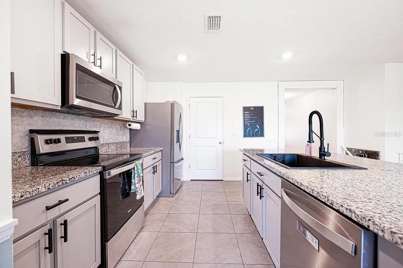 8574 TRIUMPH Circle – photo 4