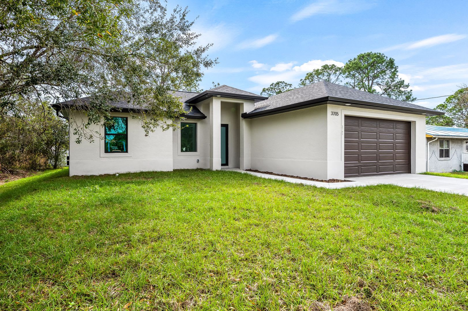 Beautifully Renovated Home with Modern Open-Concept Design in Lehigh Acres – photo 3
