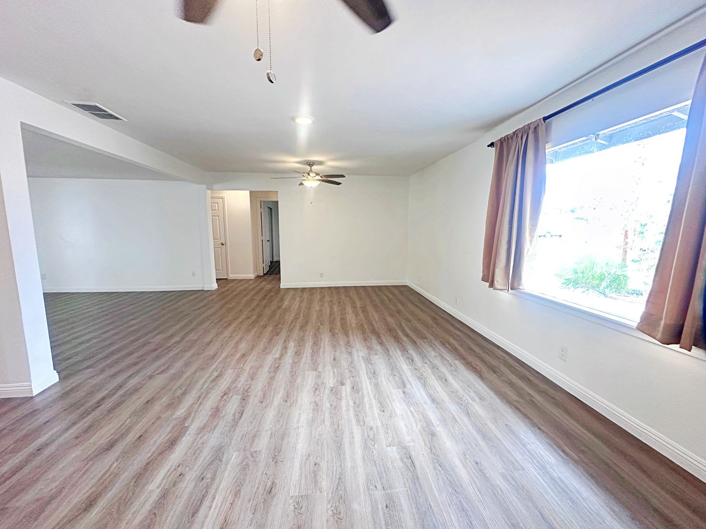 Remodeled 3-Bedroom Home Near Downtown—Covered Parking, Landscaping & Pest Control Included – photo 5