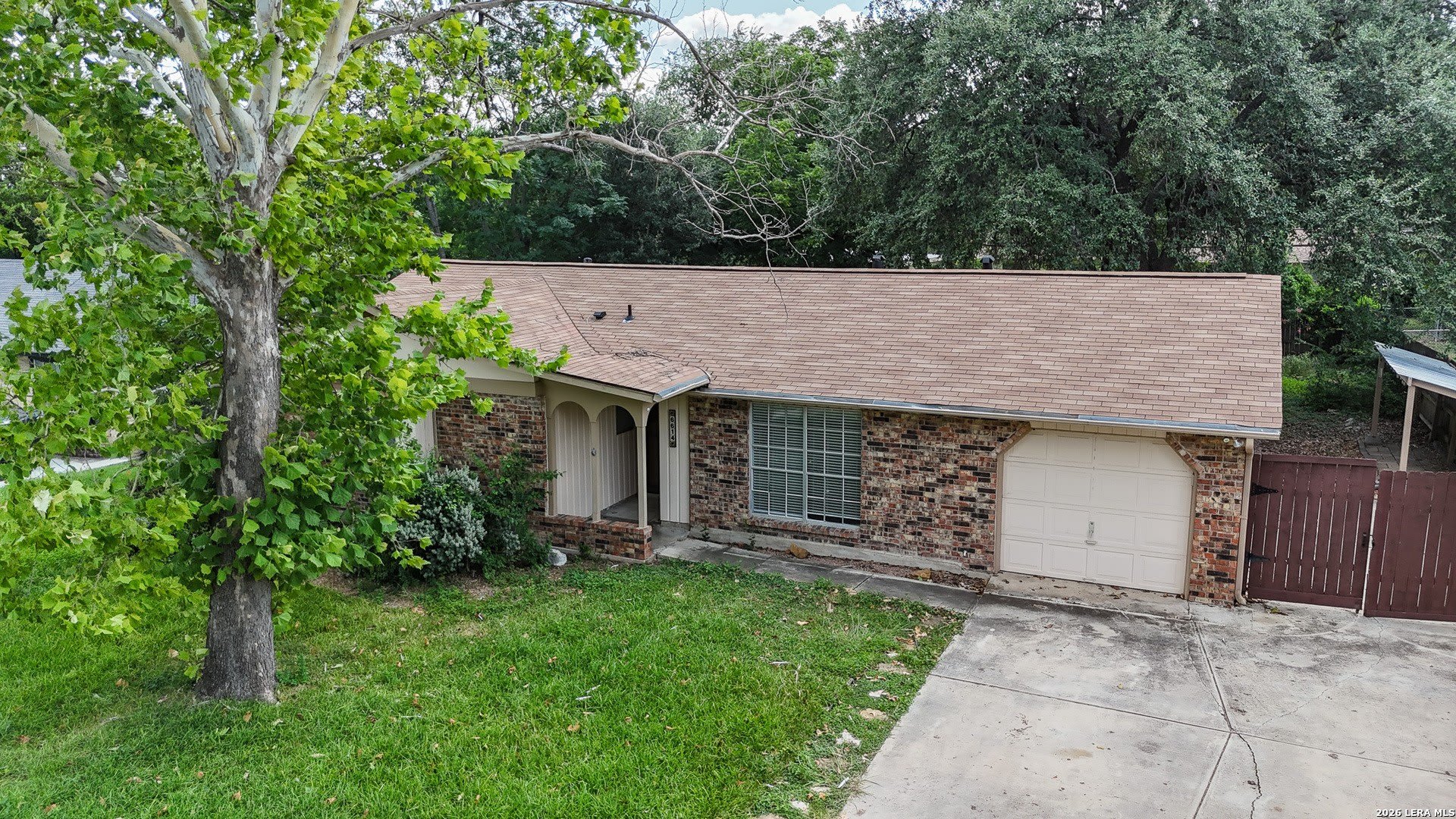 6614 PEACH TREE DR – photo 3