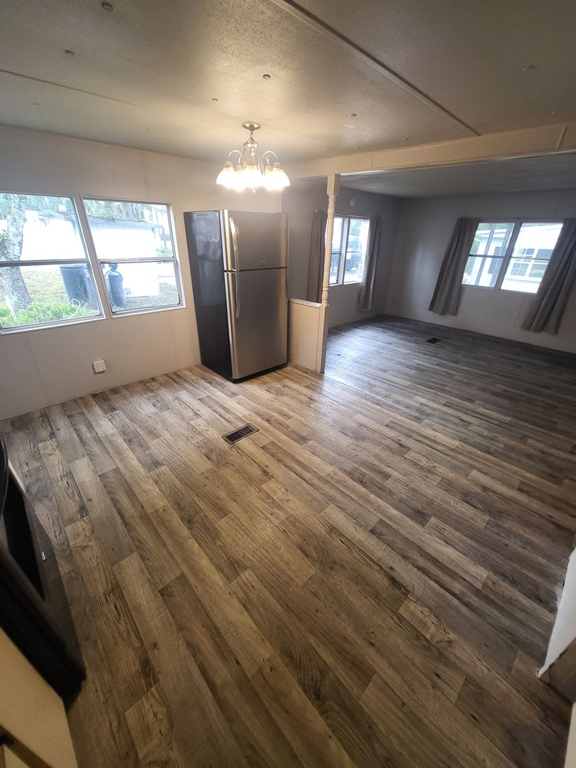 Freshly painted spacious 2-bedroom 1-bath home with a screened porch and storage shed. – photo 3