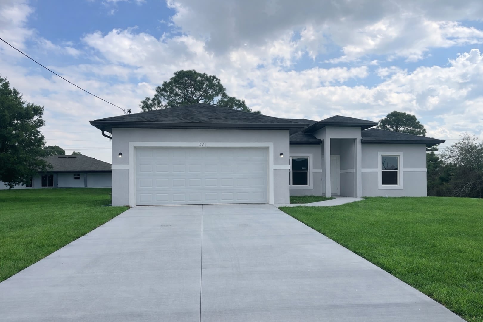 New 4 Bed 2 Bath 2 Car Garage Family Retreat In Desirable Lehigh Acres – photo 1