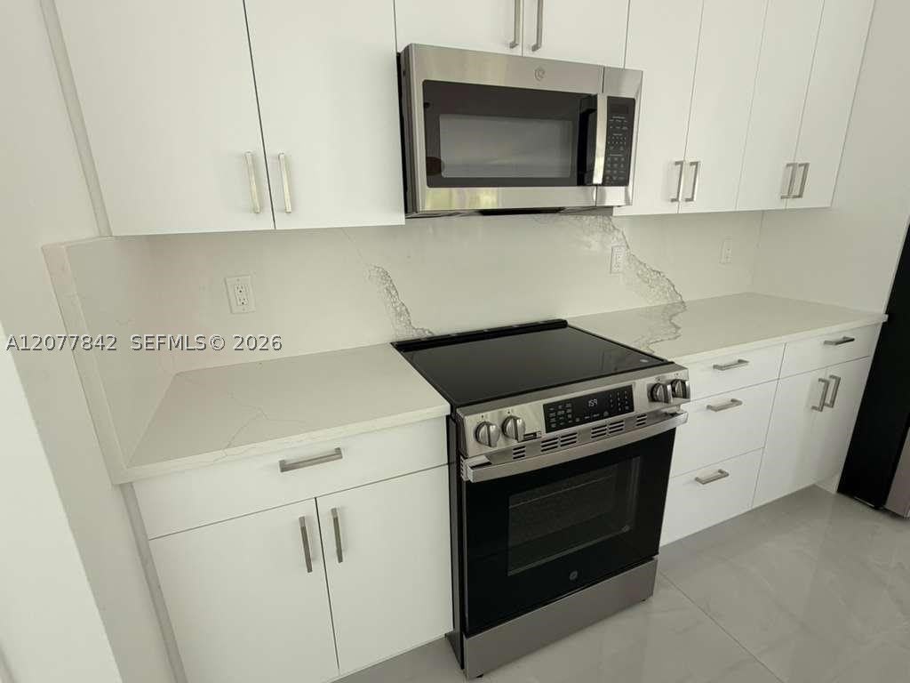 8636 100th Ct – photo 3
