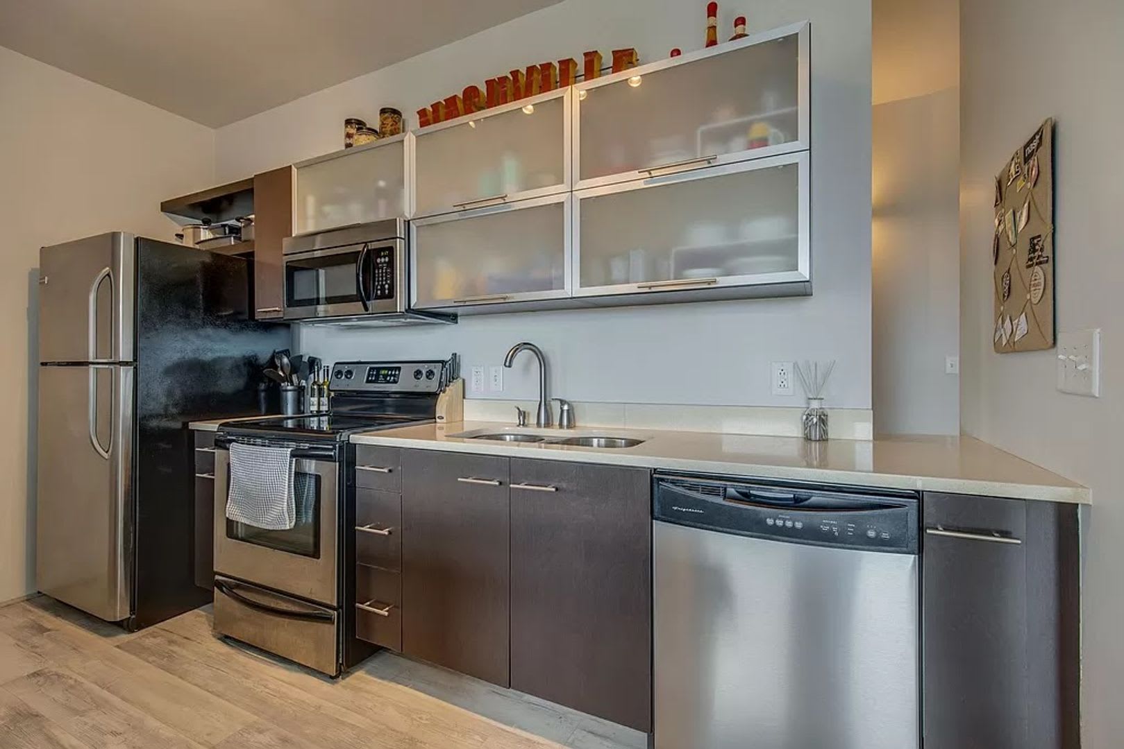 1 Bed/1 Bath Condo at 5th and Main, Assigned Parking, Washer/Dryer/Covered Balcony – photo 3