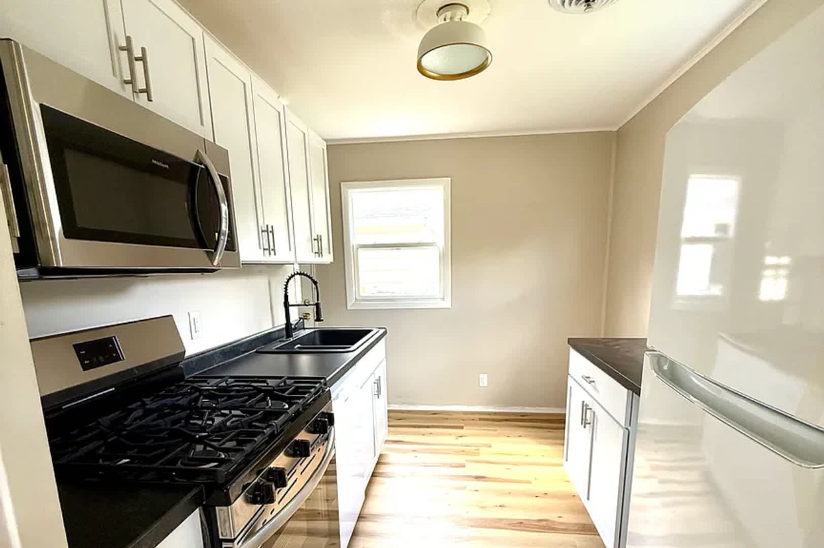 Sun-Filled 2BR Home on Corner Lot with Spacious Garage – photo 4