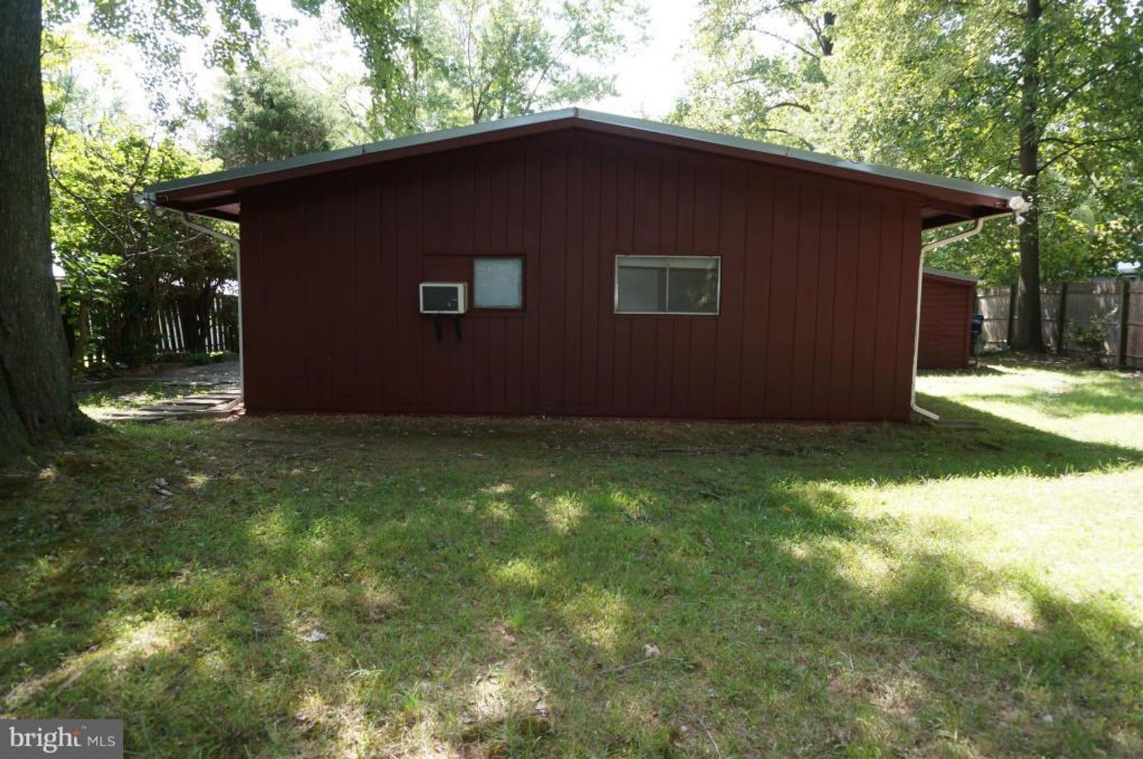 Enjoy The Ease Of One Level Living In This Charming Rustic Contemporary Home Tucked Away Among Mature Trees In The Highly Desirable Holmes Run Acres Community – photo 3