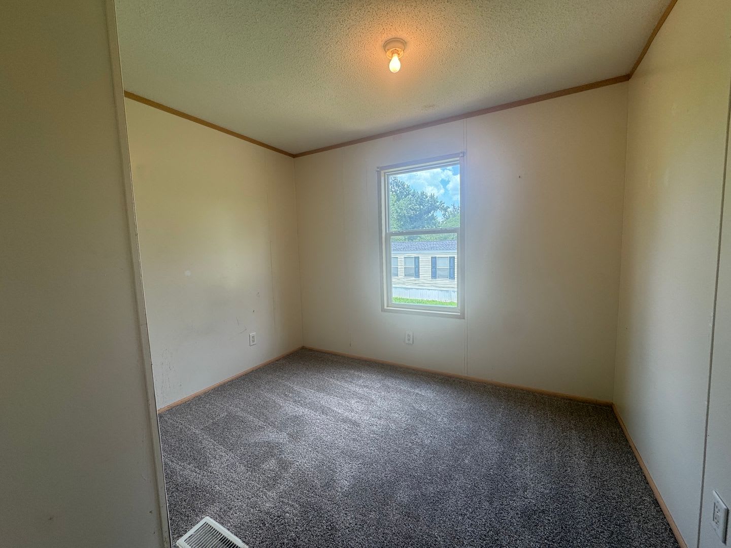 Charming 3/1 Mobile Home in Quiet Park w/ Well, Septic, & Lawn Maintenance – photo 3
