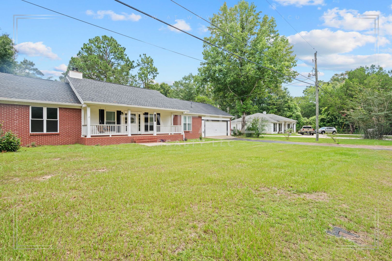Beautifully Updated 3 Bedroom Home With Fenced Yard Double Garage – photo 4