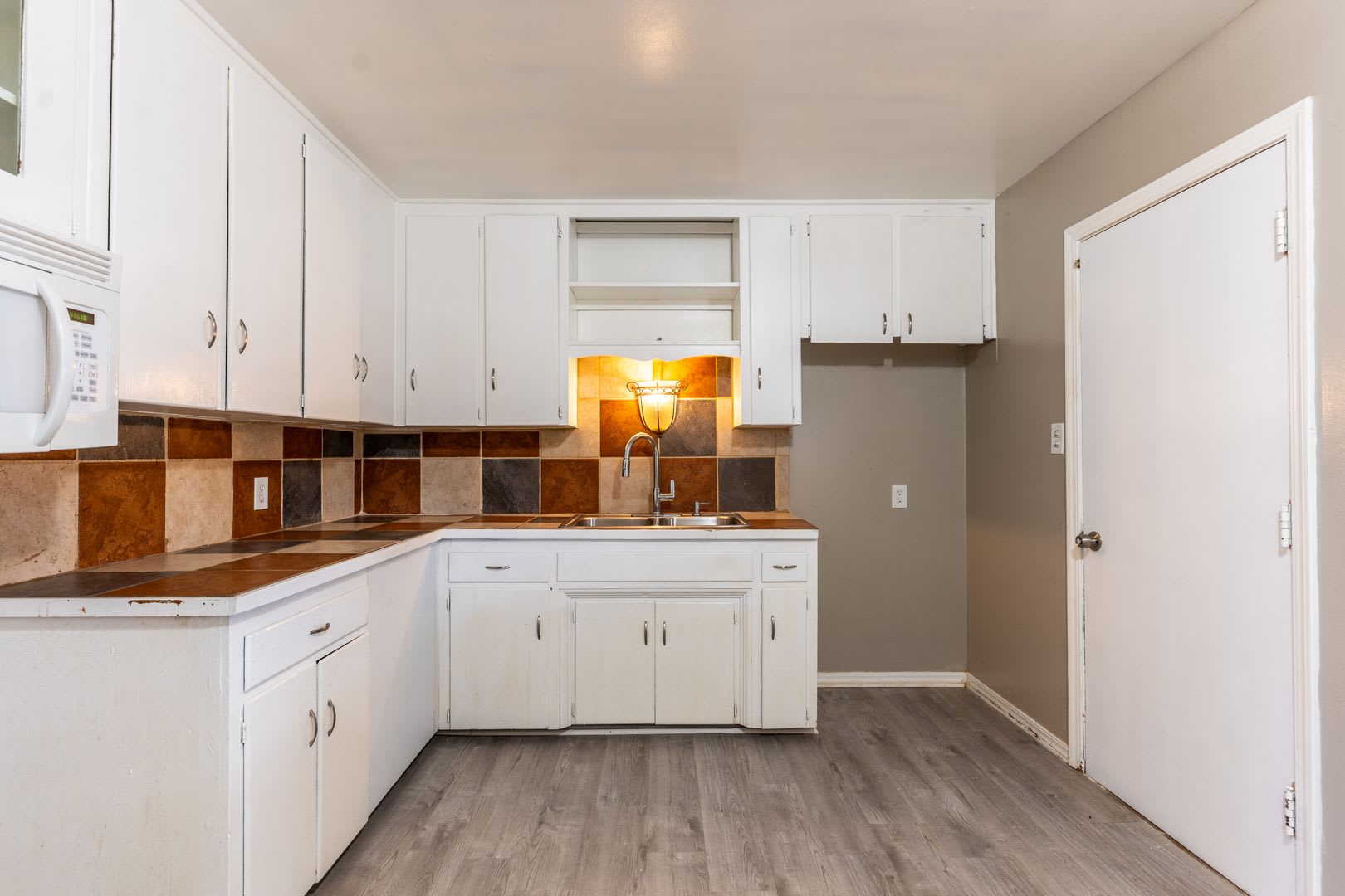 Introducing a charming 4-bedroom, 1-bathroom home nestled in the heart of Midwest City – photo 5