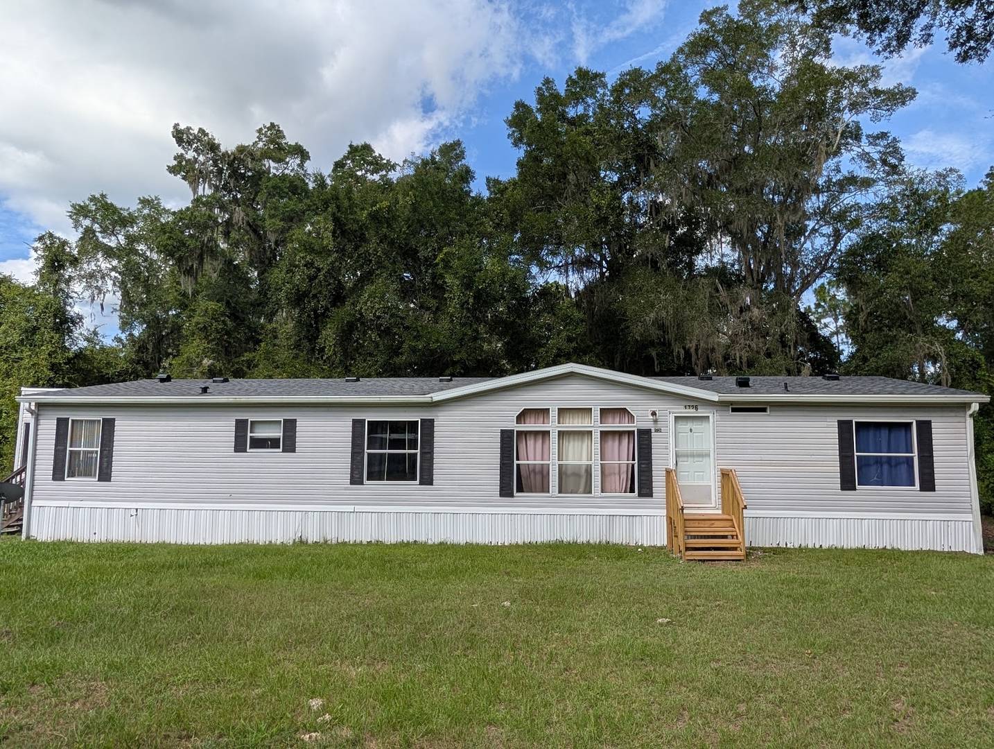 3 bedroom 2 bath with NEW roof on 1/2 acre of land with a FENCED YARD – photo 3