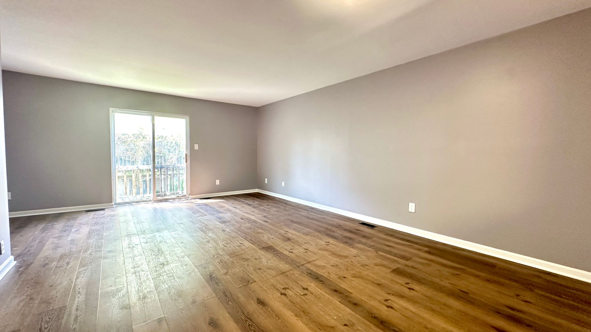 Updated 3-Bedroom Townhome with Finished Walkout Basement, Fenced Yard & Deck – photo 5